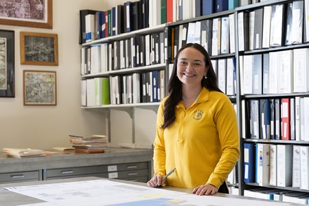 Employee Abby Hanson in file room at Facility and Services